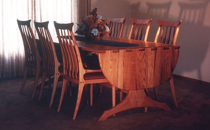 Oak drop leaf dining table and chairs